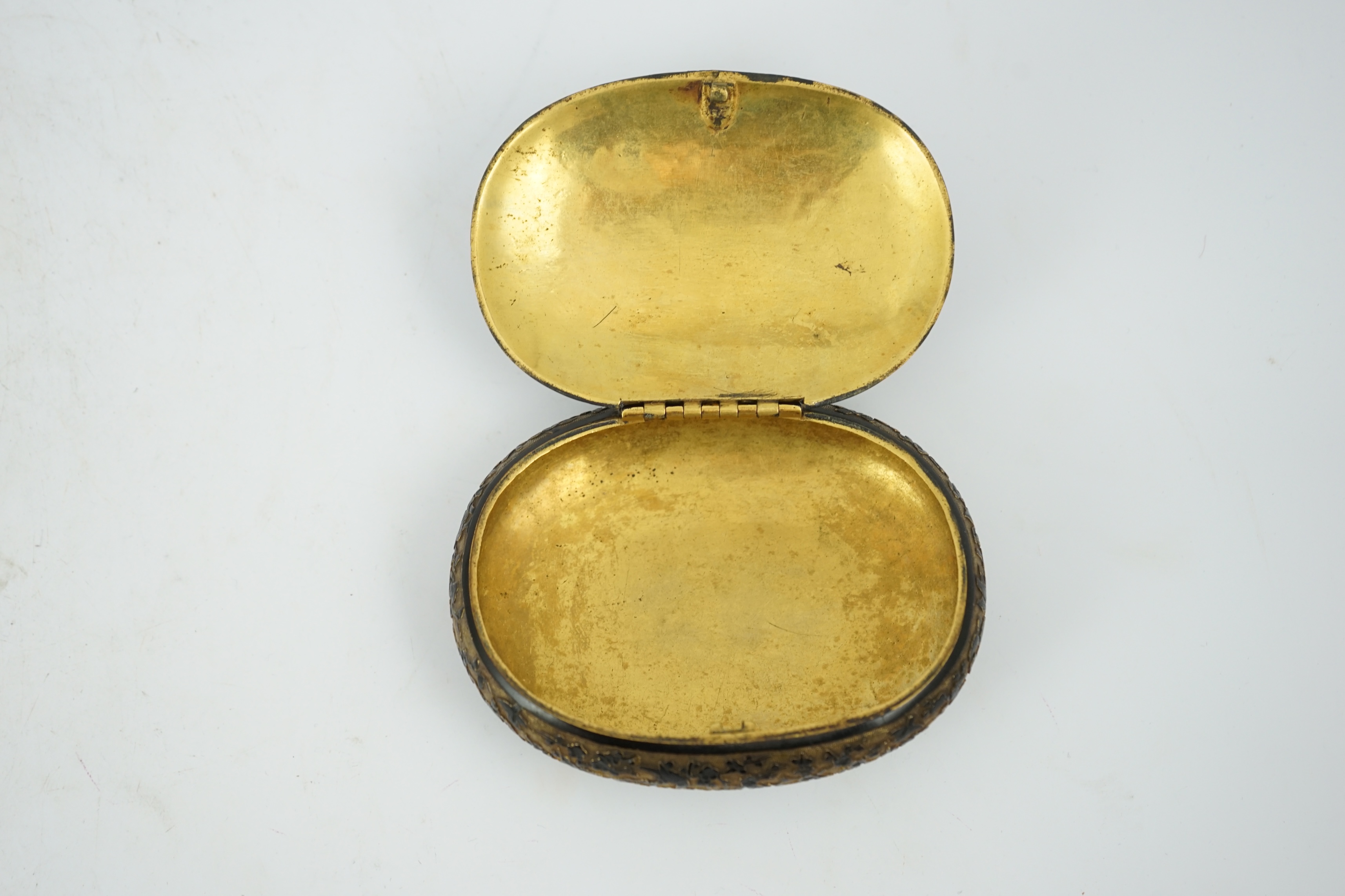 A Japanese export gilt bronze Sawasa oval tobacco box, 18th century